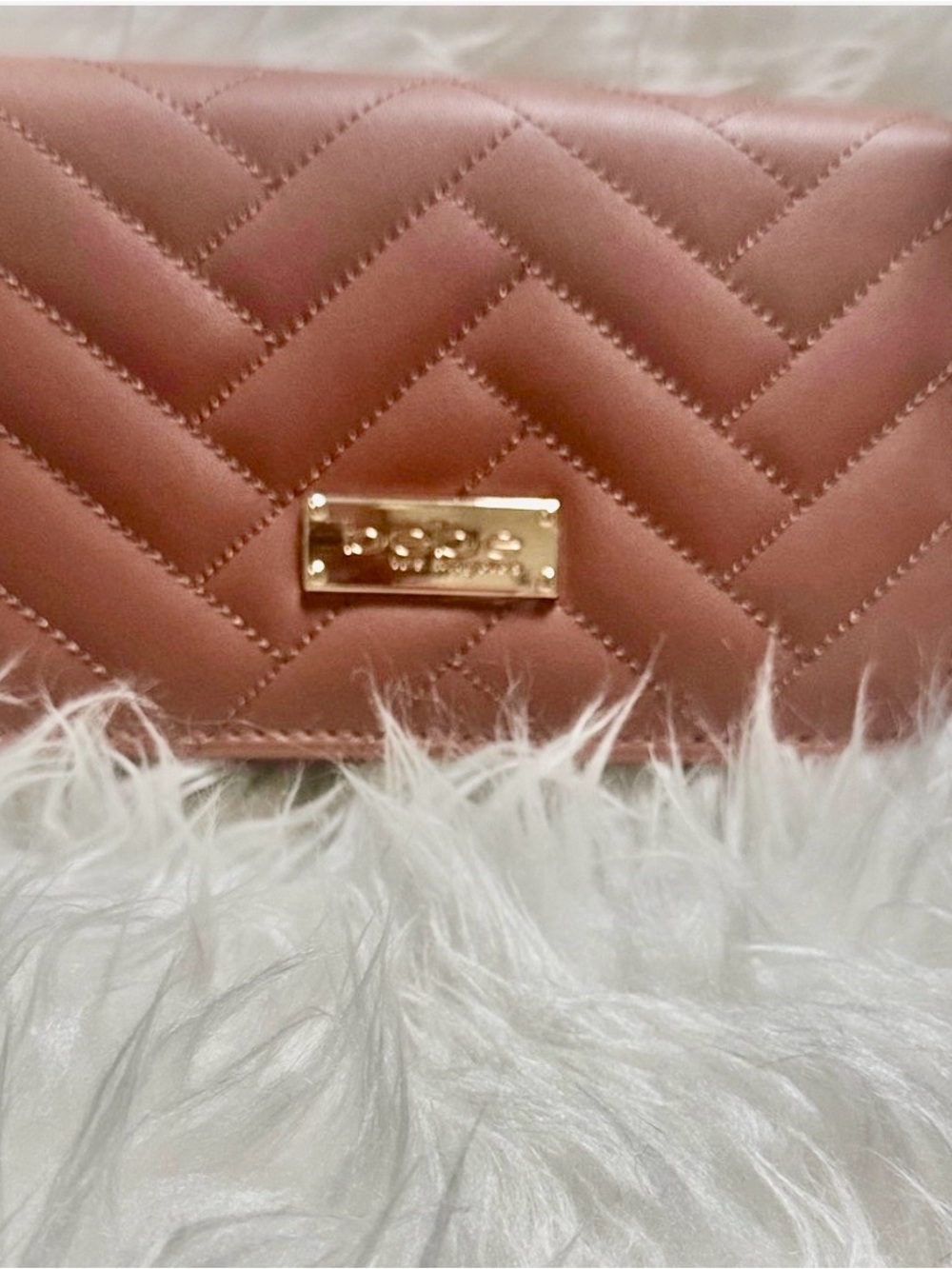 Bebe Quilted Mauve Crossbody Clutch with Gold Plaque